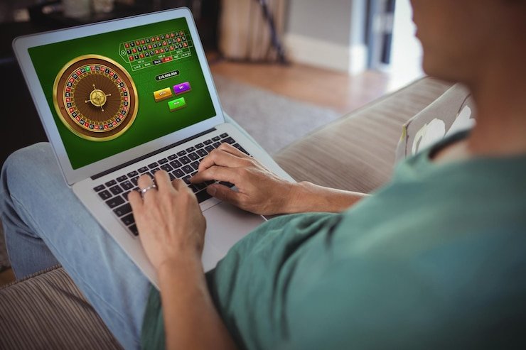 Tampilan permainan Buffalo King di 1xbet login menampilkan gulungan dengan simbol binatang liar dan kontrol putar otomatis